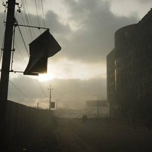 Kyiv in darkness, a broken sign in front of a darkened road